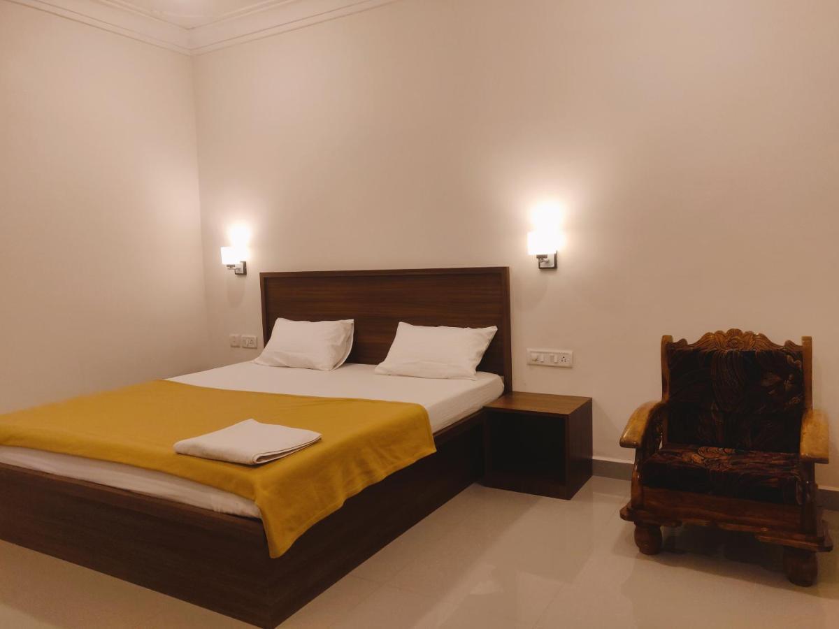 Morjim Sunset Hotel Quarto foto